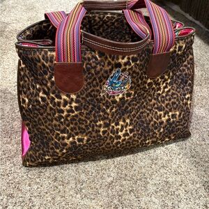 Consuela Leopard Print Duffel Bag with Multicolor Straps.